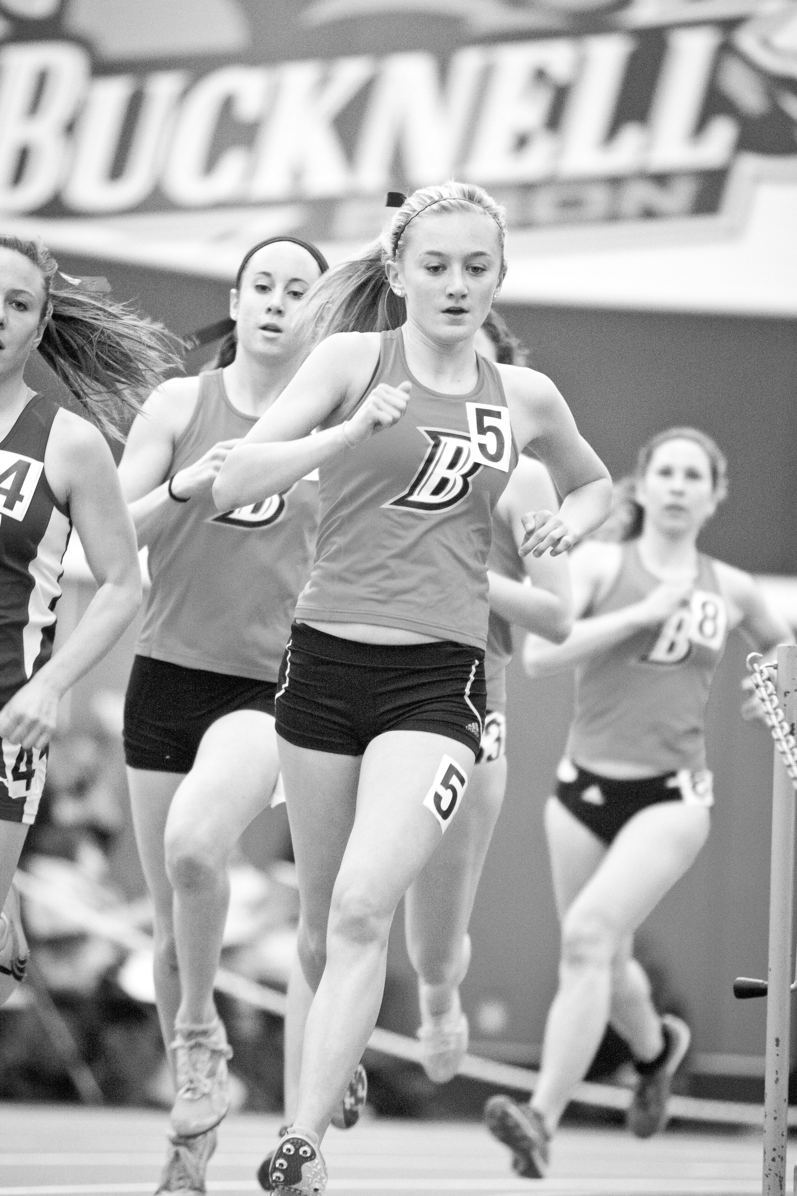 Edward Louie | The BucknellianAllison Billas '16 and Deanna Godby '16 race in the 3000 meter run. Their points bolstered the woman's track and field to a second place finish.