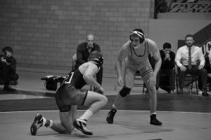 Estie Pyper | The Bucknellian Adam Healey '13 stares down his opponent in a recent match. The men's wrestling team dropped both its matches this weekend against American and Clarion. 