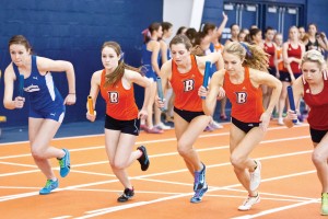 Edward Louie | The Bucknellian Nora Adams '16, Morgan Roche '15 and Emily Wakmunski '14 take off in the women's 4x400 m relay at the Bucknell Winter Classic. The Bison won four gold medals, three of them by first years. 