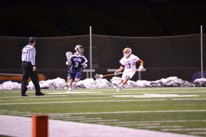 Ally Boni | The Bucknellian Jackson Place '14 closely guards an attackman in a recent game against Penn State. The Bison came back from a 5-3 halftime deficit to defeat Army 9-8 this past weekend.